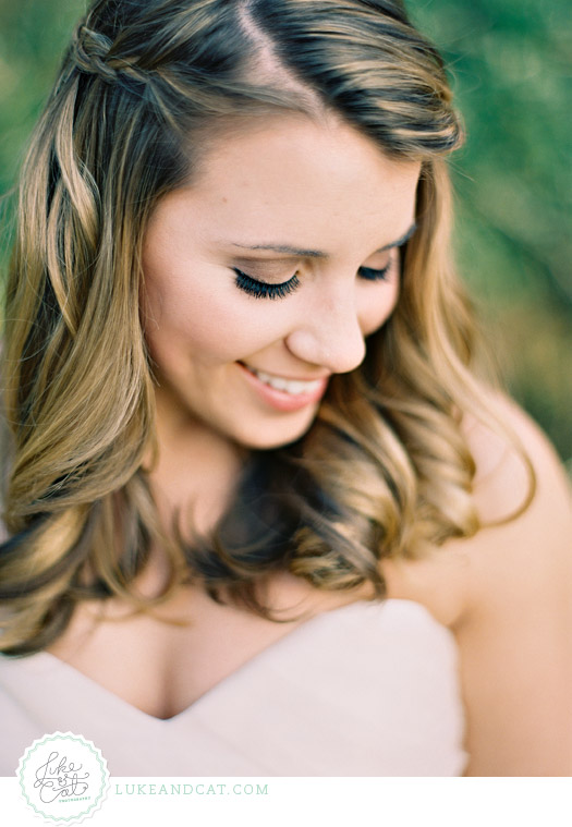 Bride with brown eyeshadow and natural wedding day makeup and hair.