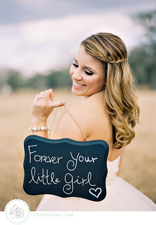Bride holding sign 
